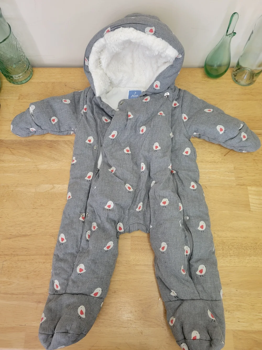 Gray Jacadi Paris infant snowsuit featuring a red and white bird pattern 12m
